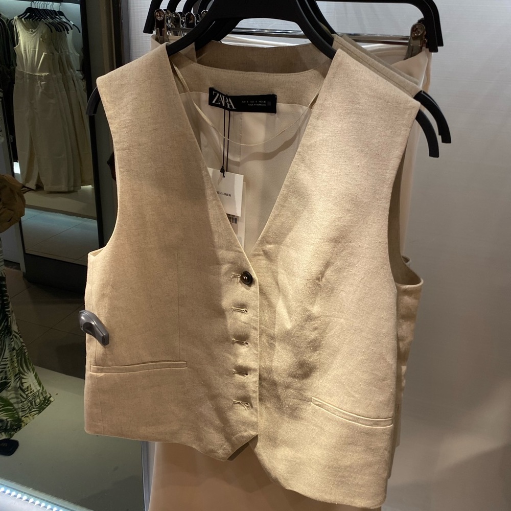 beige vest